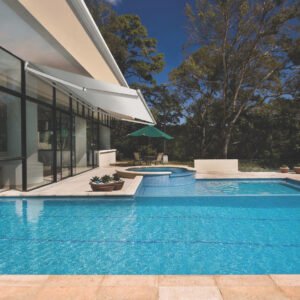 Bella Awning providing shade over pool