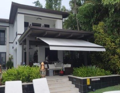 Motorized awning with remote control for shade